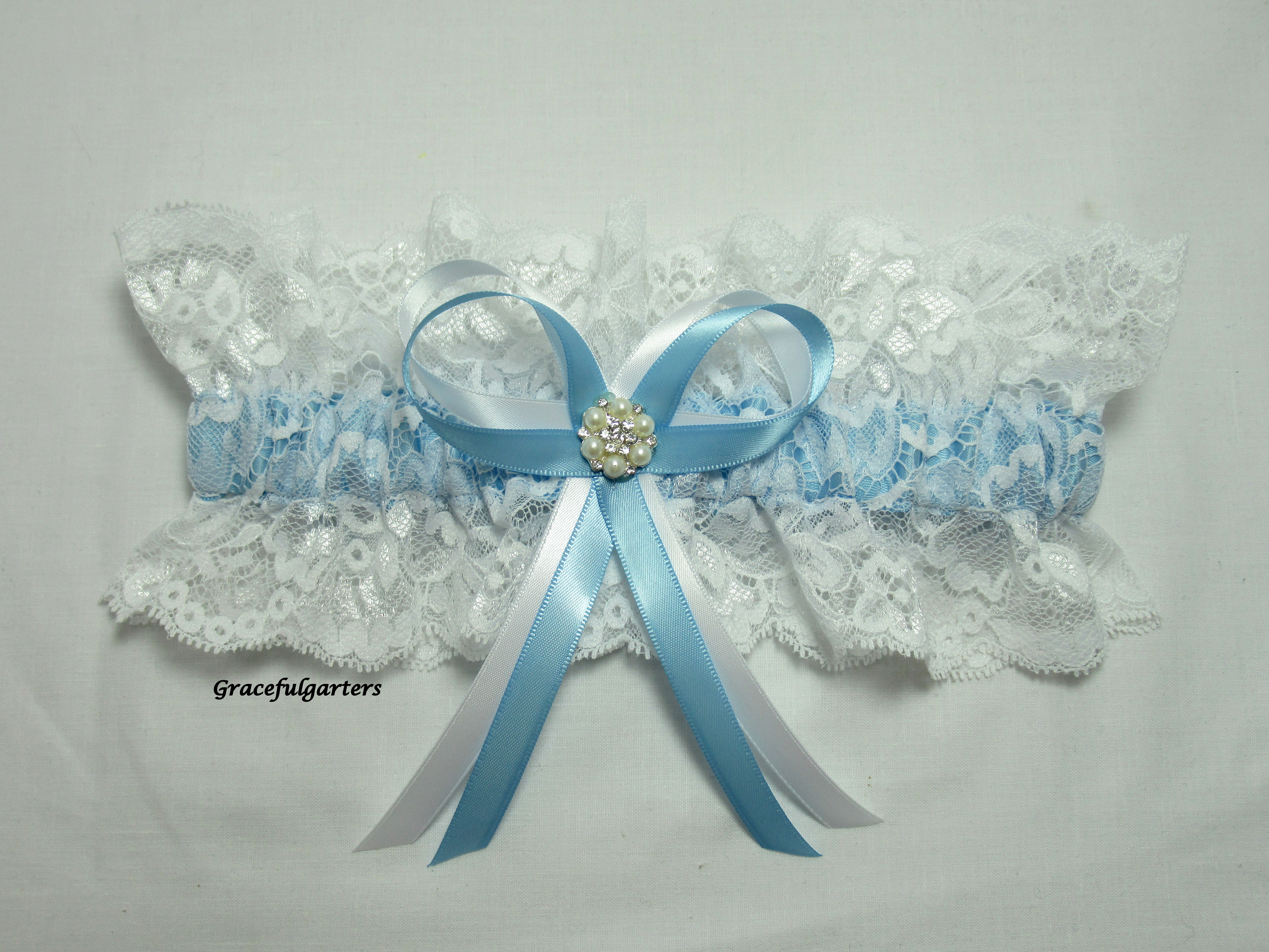 Blue lace garter with centre bow